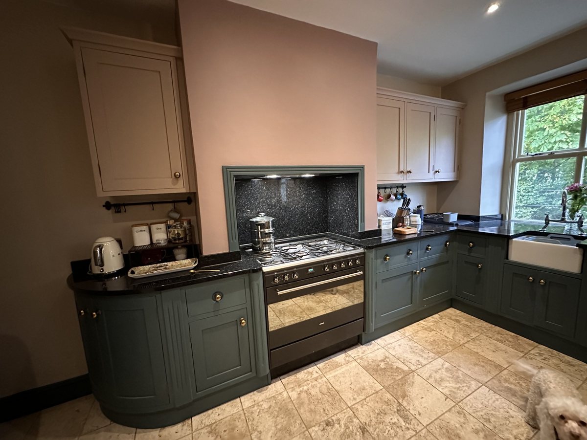 Kitchen after: base units in Inchyra Blue, wall units in Dead Salmon