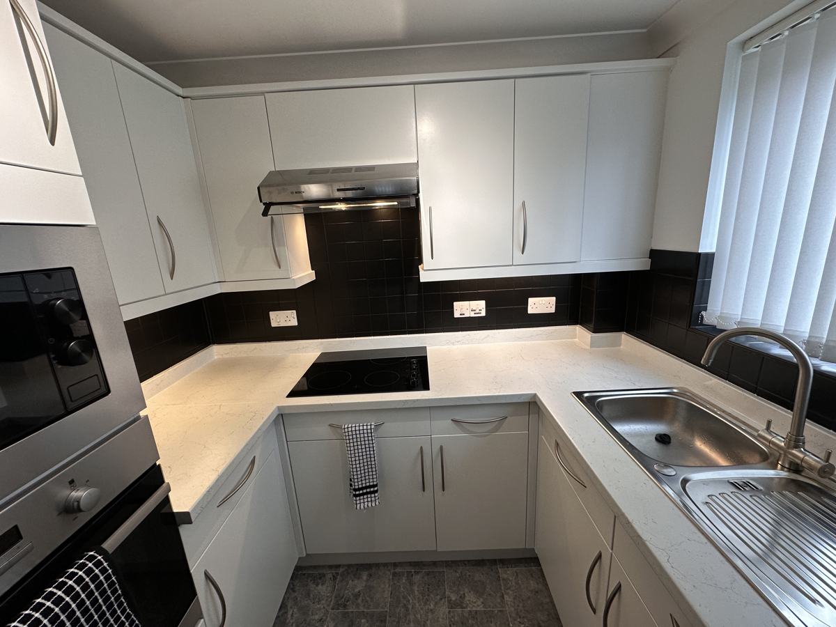 Uppermill kitchen after: white units