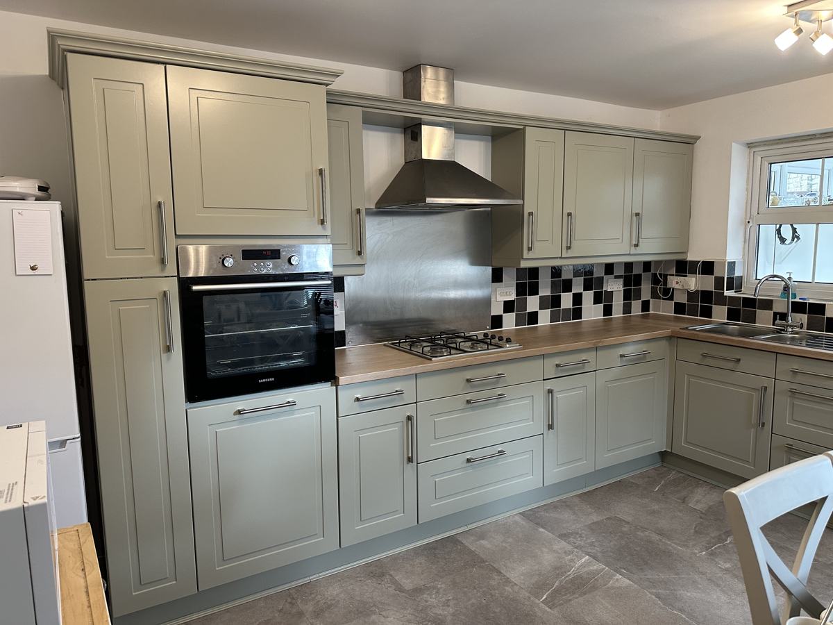 Carrbrook kitchen after: sage green units