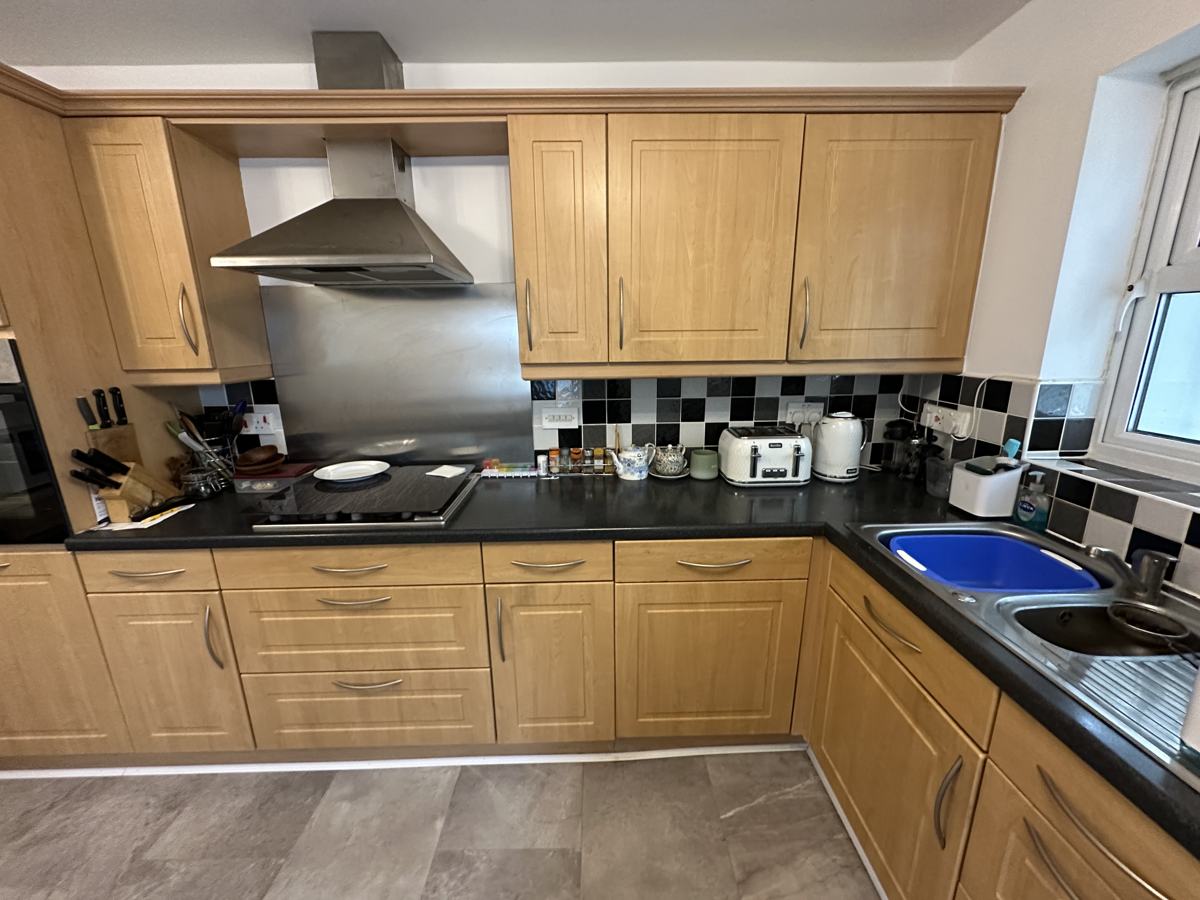 Carrbrook kitchen before: light oak units