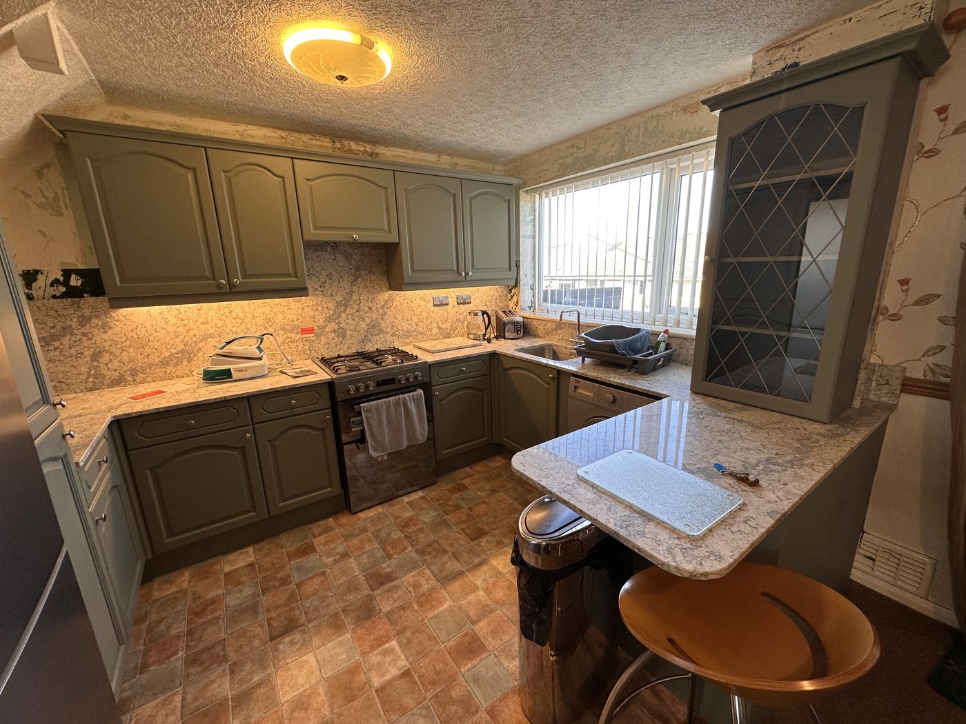 Stalybridge kitchen after: deep green units and quartz worktops