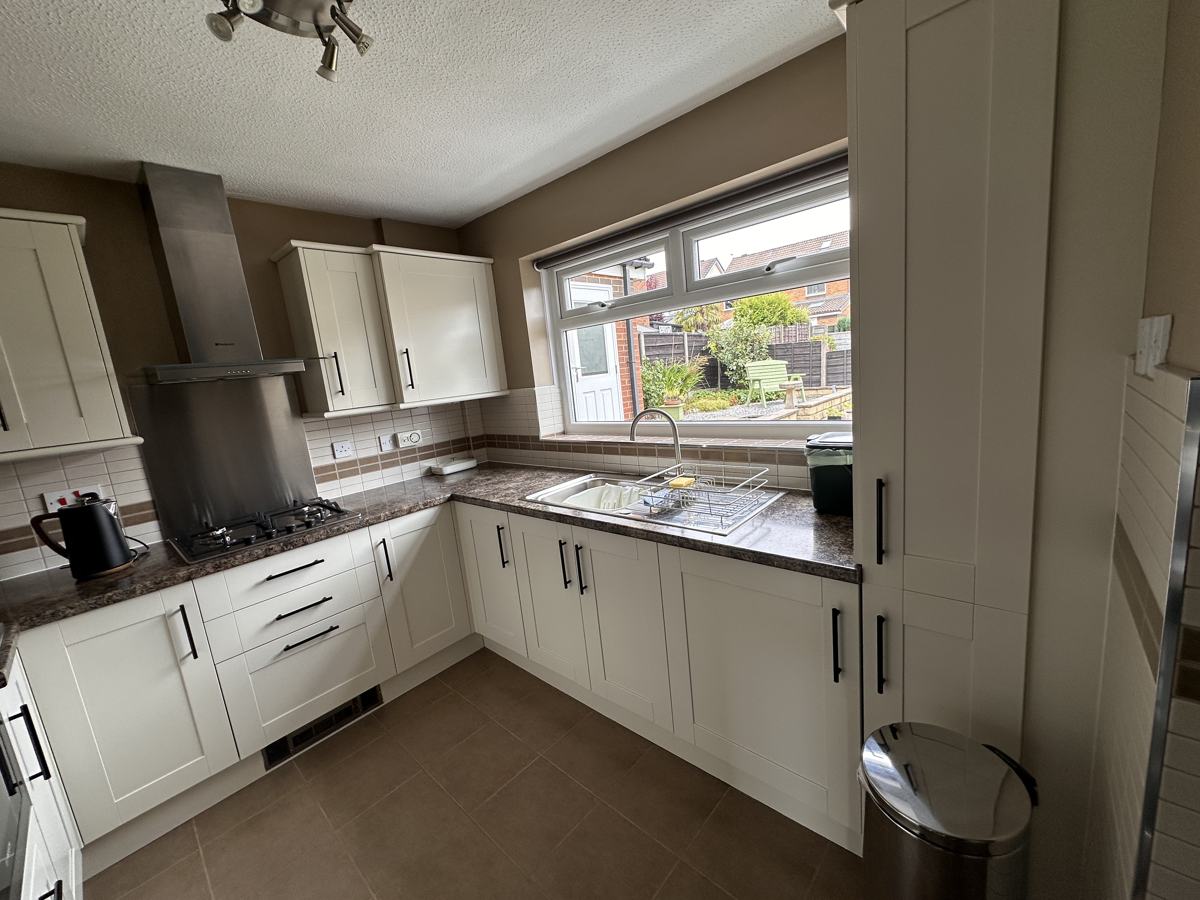 Royton kitchen after: units resprayed in Slipper Satin